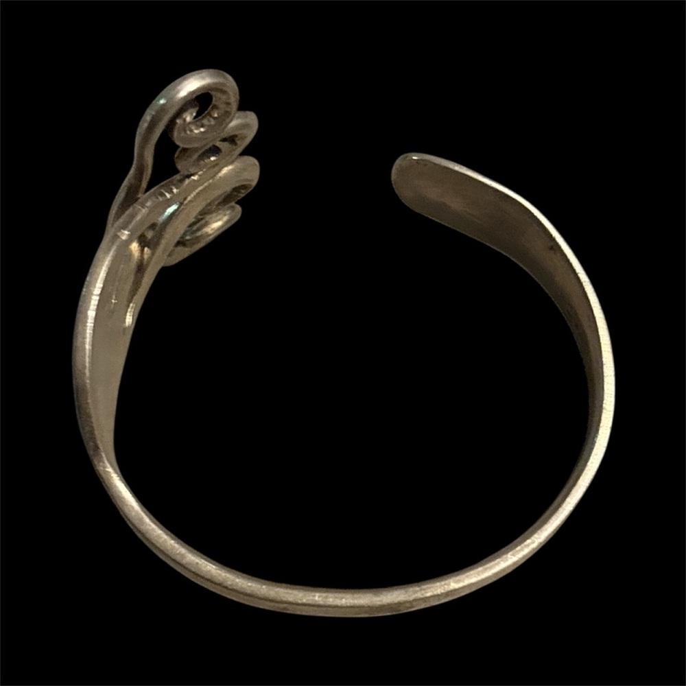 Elegant Silver Swirl Design Bangle Bracelet - Picture 3 of 11
